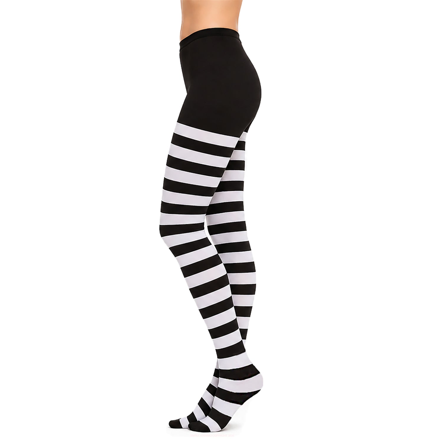 Bold black and white festival tights styled with edgy fashion