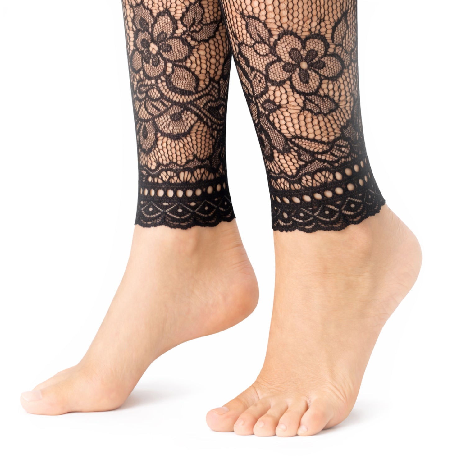 Close up of the feet of some floral footless tights