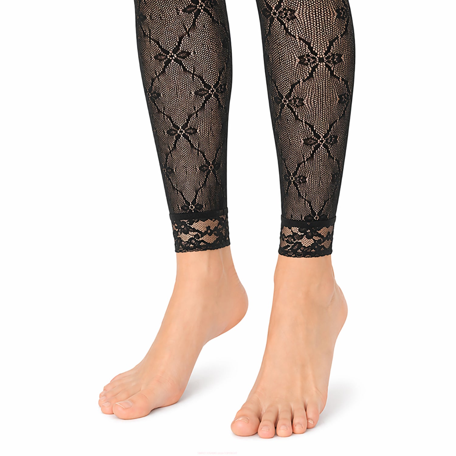 Close up of footless tights, bow pattern