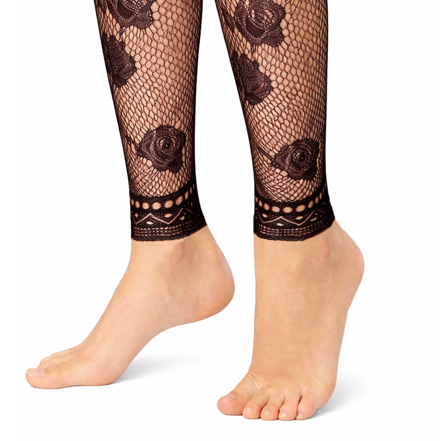 A close up of the footless tights showing the intricate floral lace detail